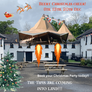 Two tipis like rockets with flames coming out of them are coming into land in a photo of the white washed courtyard buildings. There is a Christmas tree in the front of the picture. Santa with his reindeer flying over the roof top and Christmas lights swinging from the buildings.